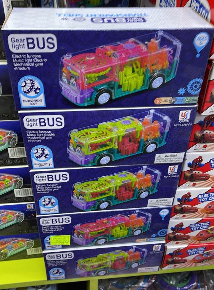 Прозрачная и светящаяся машинка Автобус с музыкальными эффектами, движущимися шестеренками, переключением режимов Gear Light Bus оптом - Фото №2